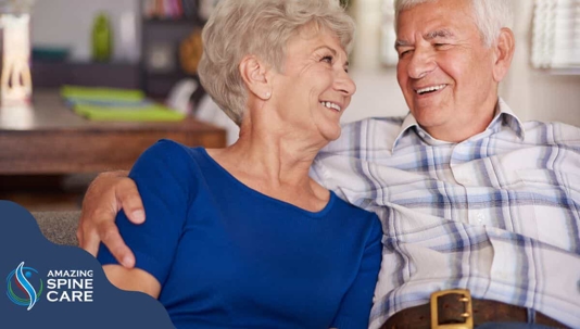Top Spinal Conditions to Know as You Age - Happy Senior Man and Woman